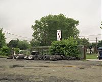 Joe's sign with tires, Trainer, Penna. 2003